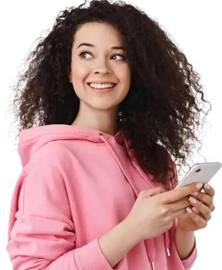 Smiling customer holding a phone while trading a gift card